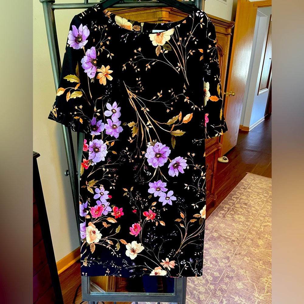 Calvin Klein Dress with sleeve detail and gold tone back zipper.